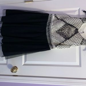 Love reign black and white tulle party dress. Size 15 fits like an XL.